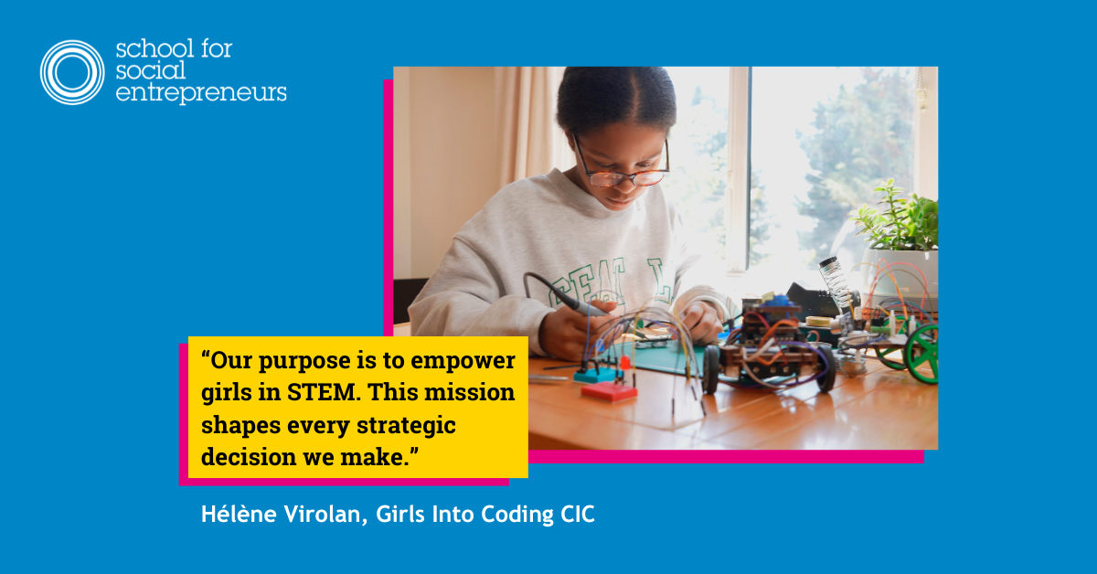 Girls Into Coding founder Avye builds a robot at her desk